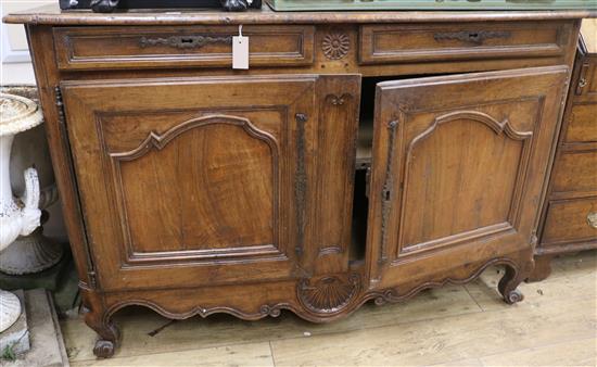 An 18th century French walnut commode, W.145cm